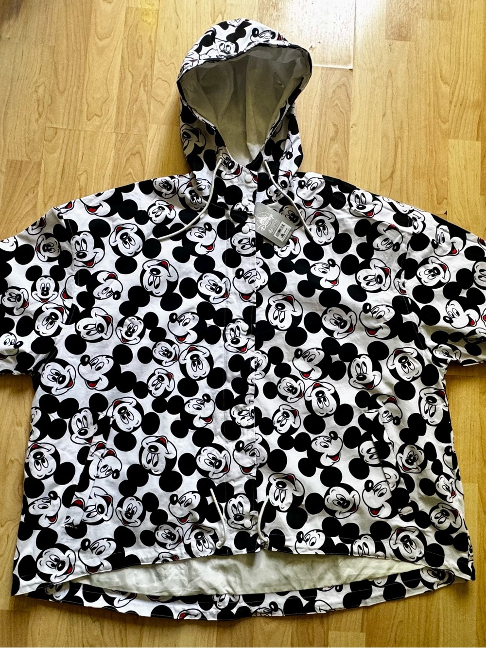 New w Tags. Women’s Black & White Mickey Mouse Hooded Jacket/raincoat. VERY CUTE